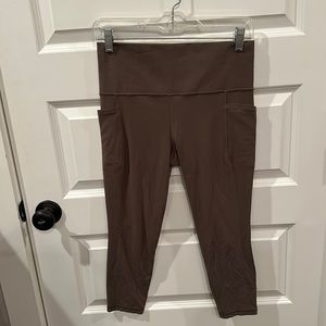 Athleta salutation stash leggings size medium petite